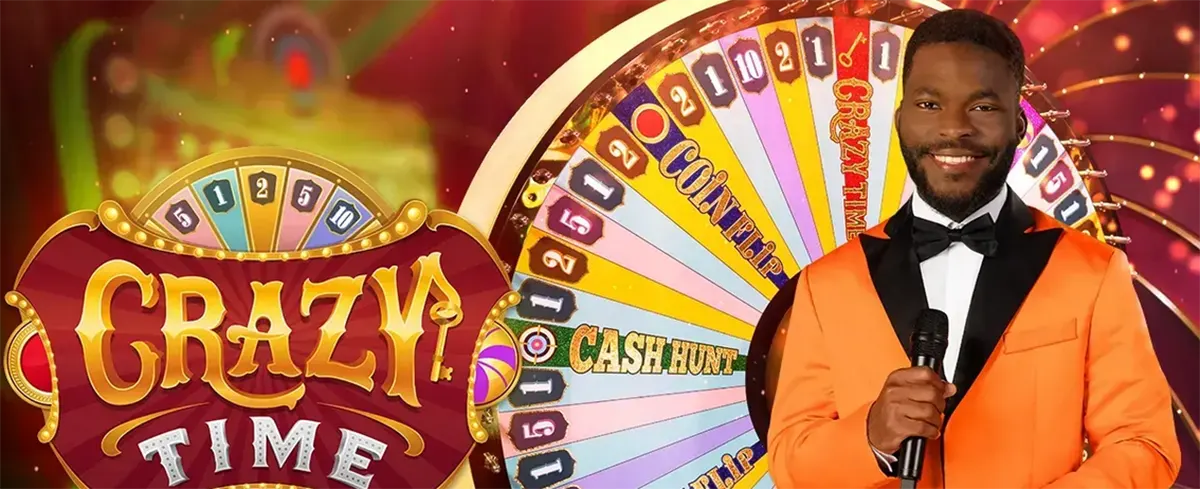 Promotional image for Crazy Time showing the large “CRAZY TIME” title beside a colourful game wheel, with a smiling male host in an orange tuxedo holding a microphone in front of the wheel.